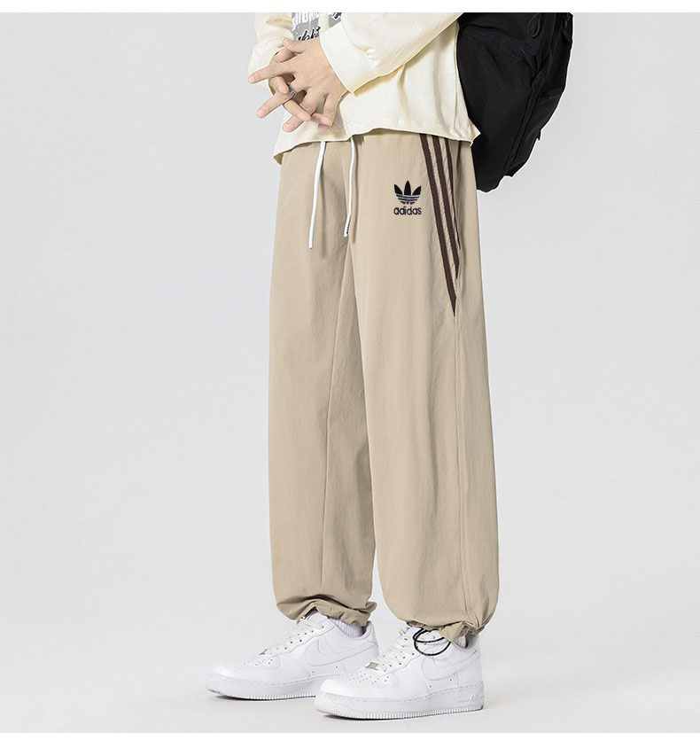 מכנסי טרנינג רחבים adidas עם שלושת הפסים – תמונה 7