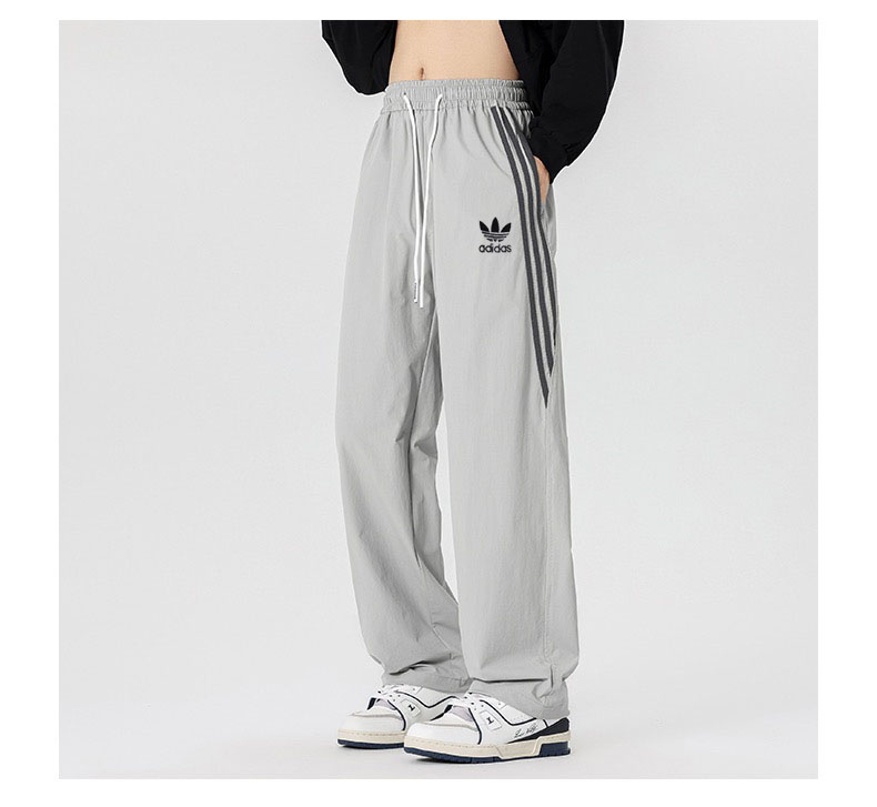 מכנסי טרנינג רחבים adidas עם שלושת הפסים – תמונה 4