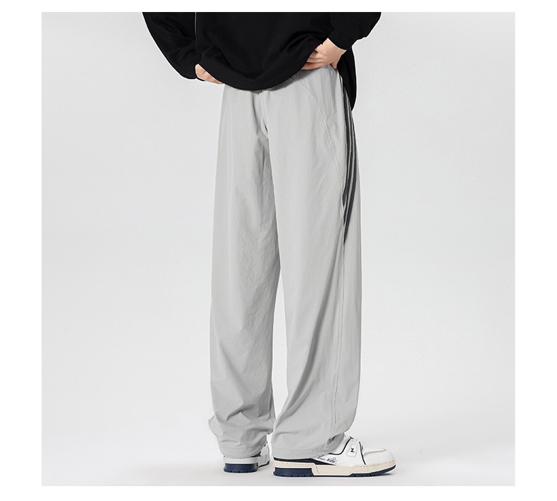מכנסי טרנינג רחבים adidas עם שלושת הפסים – תמונה 5