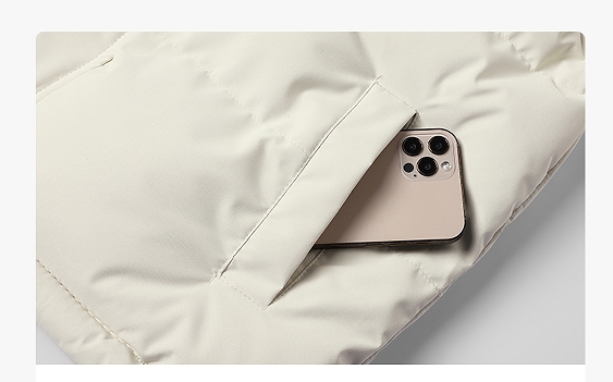וסט מרופד The North Face – כיס יד אלכסוני עם טלפון בפנים