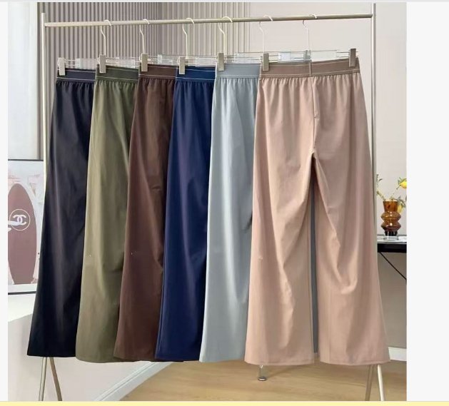 מכנסי פלאצו נשים רחבים עם גומי במותן מכנסי פלאצו נשים רחבים ליום‑יום, תצוגת כל הצבעים על קולב