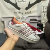 סניקרס אדידס עם סרט טוי סטורי ADIDAS